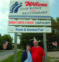 Ralph and Shirley Wilcox outside of their restaurant